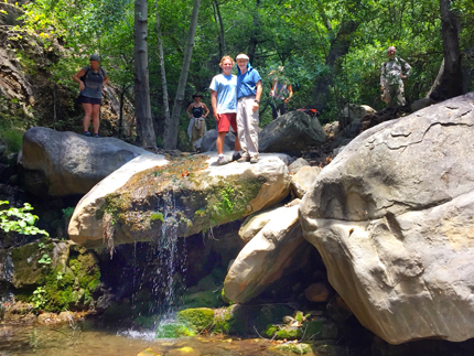 Adam Rumack and Steven Harper by waterfall, on Ojai Foundation retreat